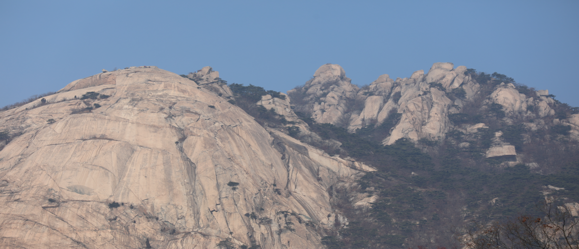 Nojeokbong Peak and Baegundae Peak Seen from Buwangsa Temple